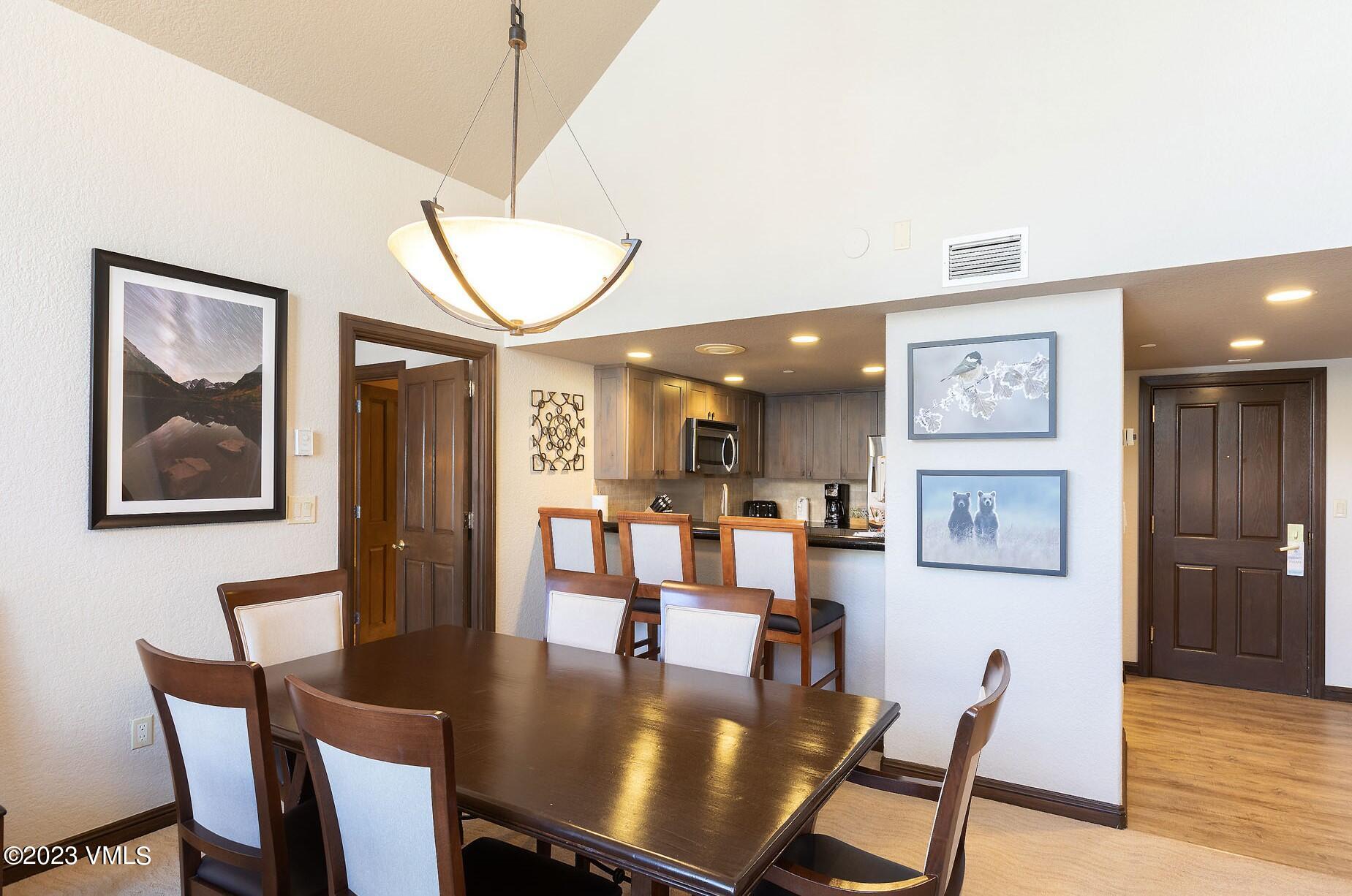 210 Offerson Road, Unit R408 WEEK 34 Beaver Creek, CO 81620 - Photo 6 of 28 a view of a dining room with furniture