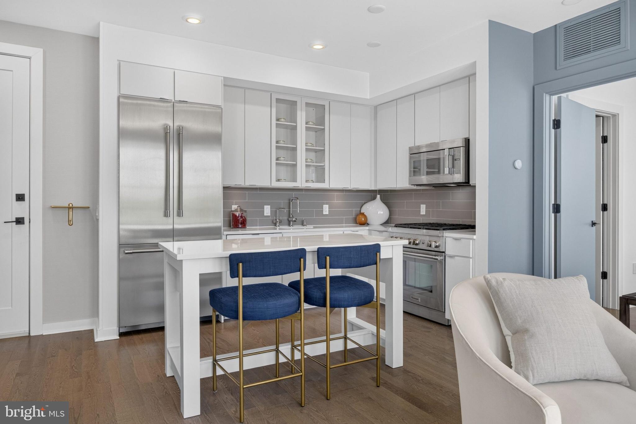 300 8th Street Northeast, Unit PH502 Washington, DC 20002 - Photo 12 of 49 Great Room Kitchen Northwest