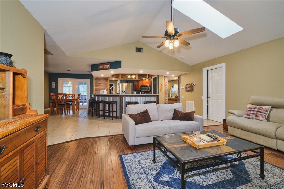 710-740 Evans Road LaBelle, FL 33935 - Photo 7 of 50 a living room with furniture and a wooden floor