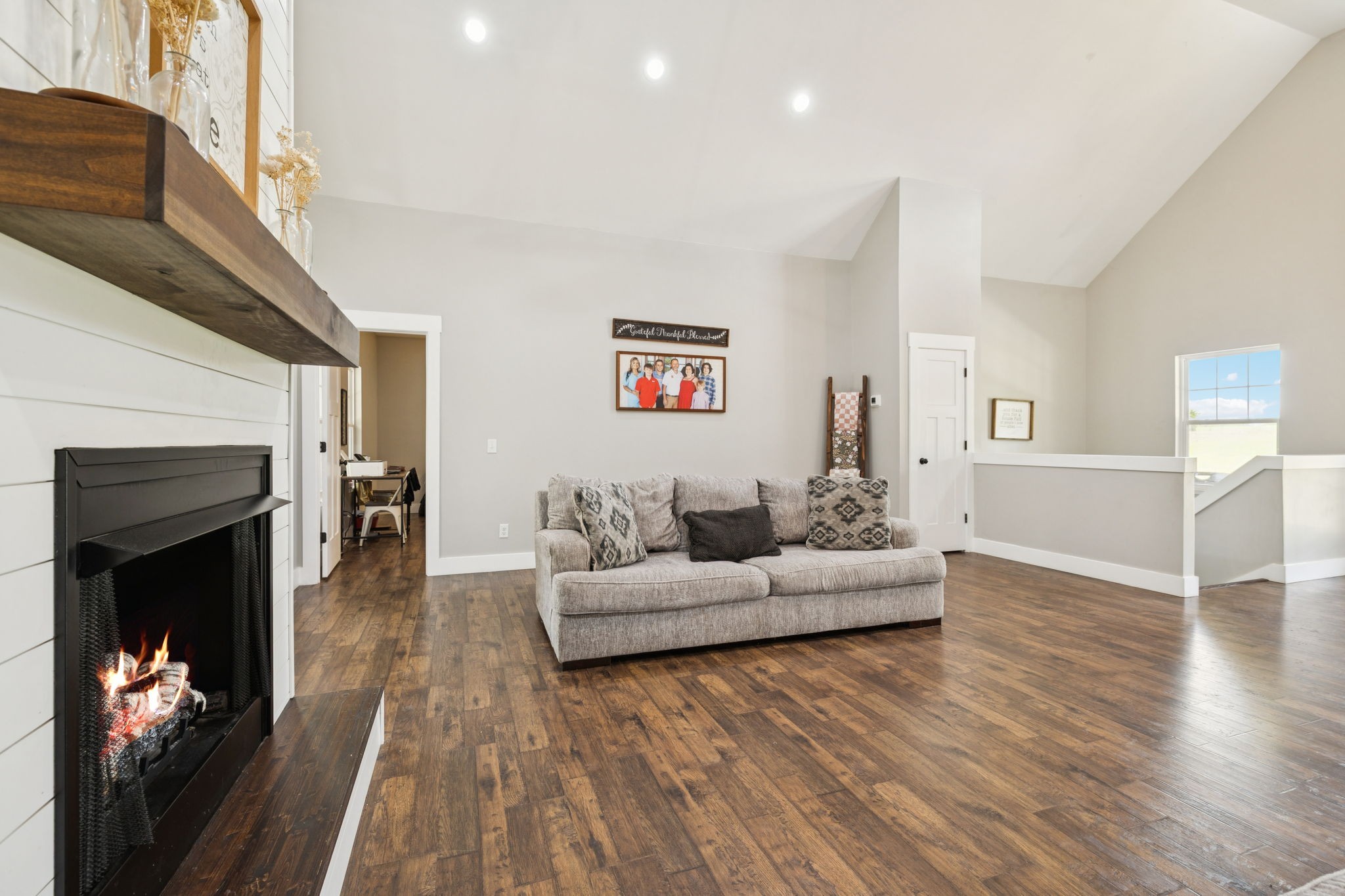 977 Elzie Williams Road Red Boiling Springs, TN 37150 - Photo 13 of 52 a living room with furniture and a fireplace