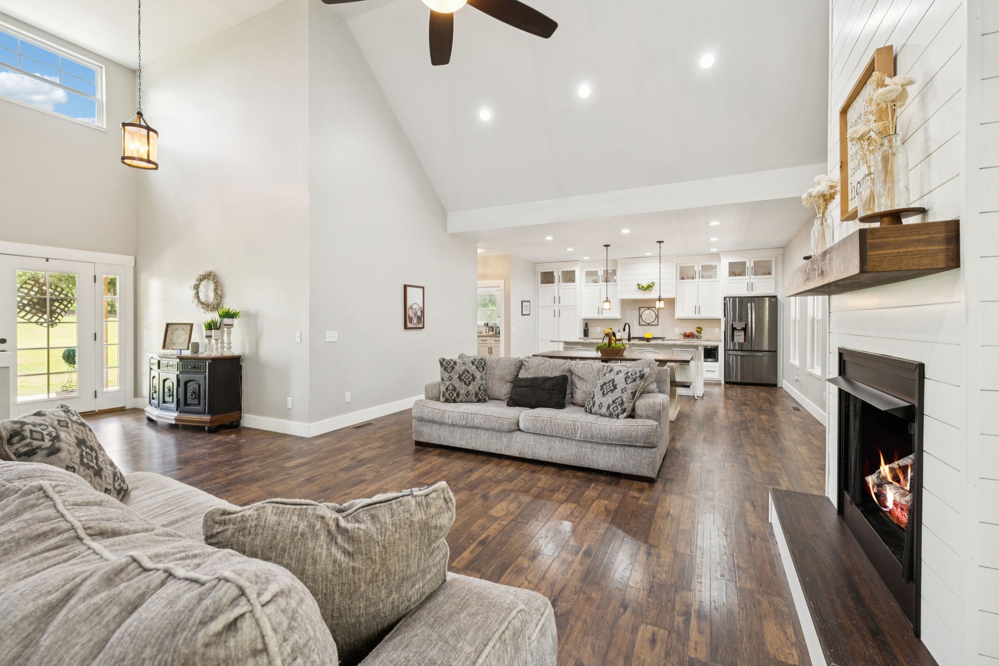 977 Elzie Williams Road Red Boiling Springs, TN 37150 - Photo 14 of 52 a living room with furniture and a fireplace