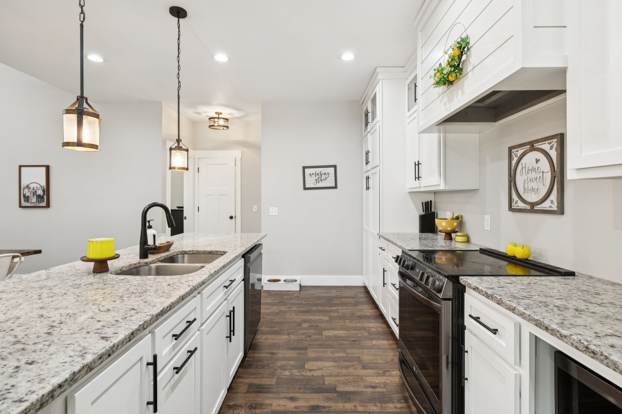 977 Elzie Williams Road Red Boiling Springs, TN 37150 - Photo 21 of 52 a kitchen with granite countertop stainless steel appliances and wooden floor