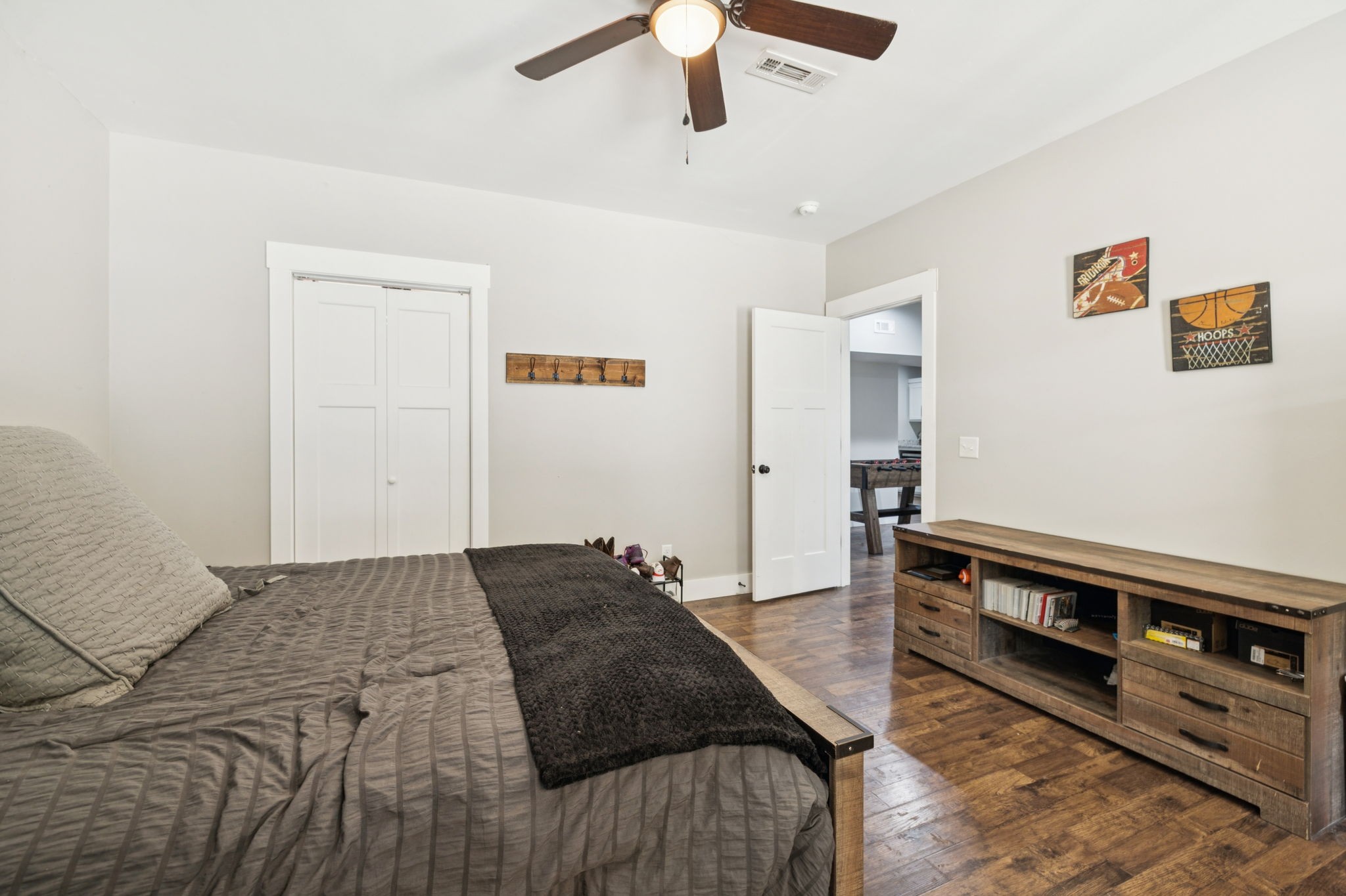 977 Elzie Williams Road Red Boiling Springs, TN 37150 - Photo 42 of 52 a bedroom with a bed and a ceiling fan