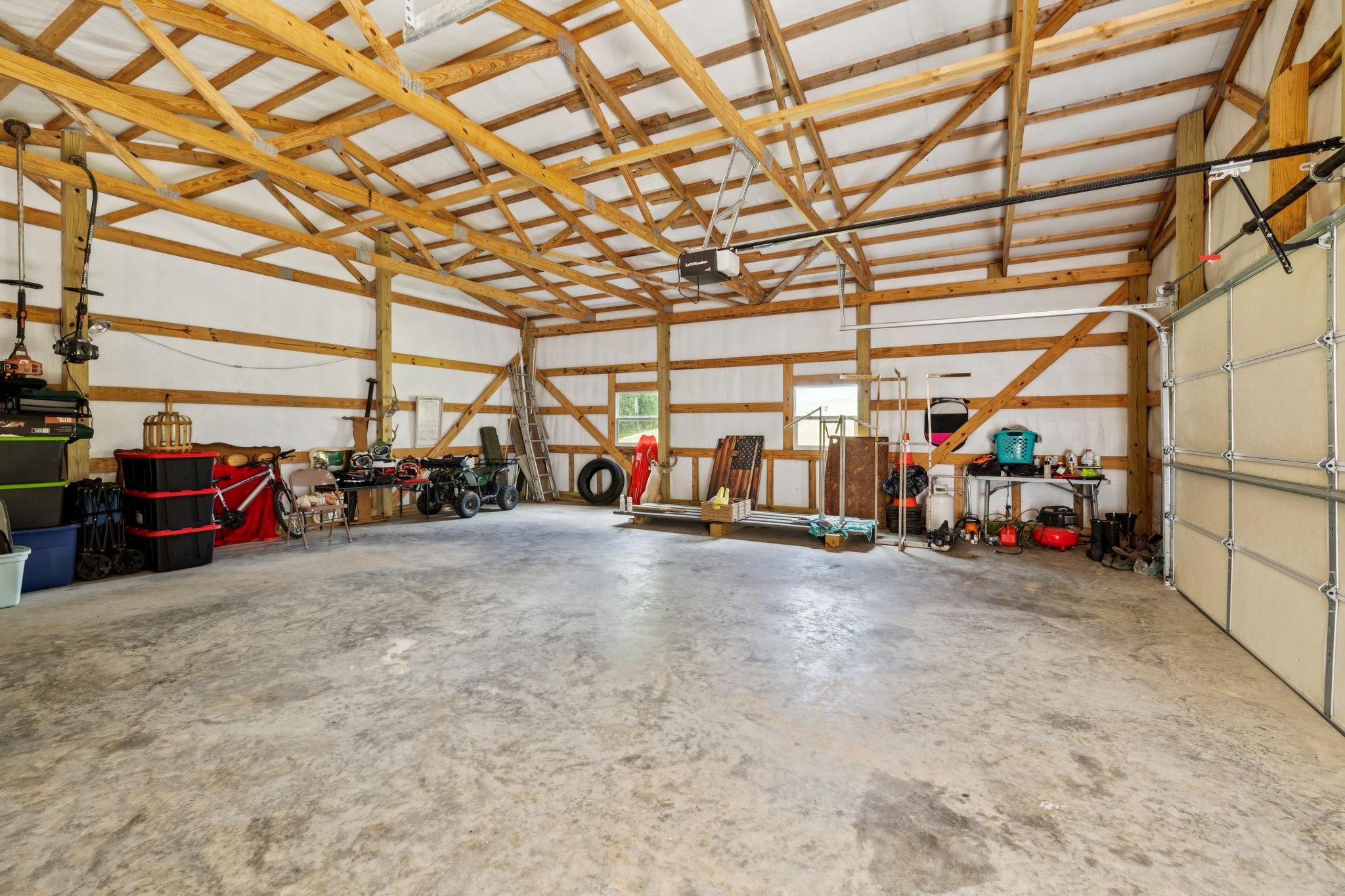 977 Elzie Williams Road Red Boiling Springs, TN 37150 - Photo 45 of 52 a view of a garage with parked cars