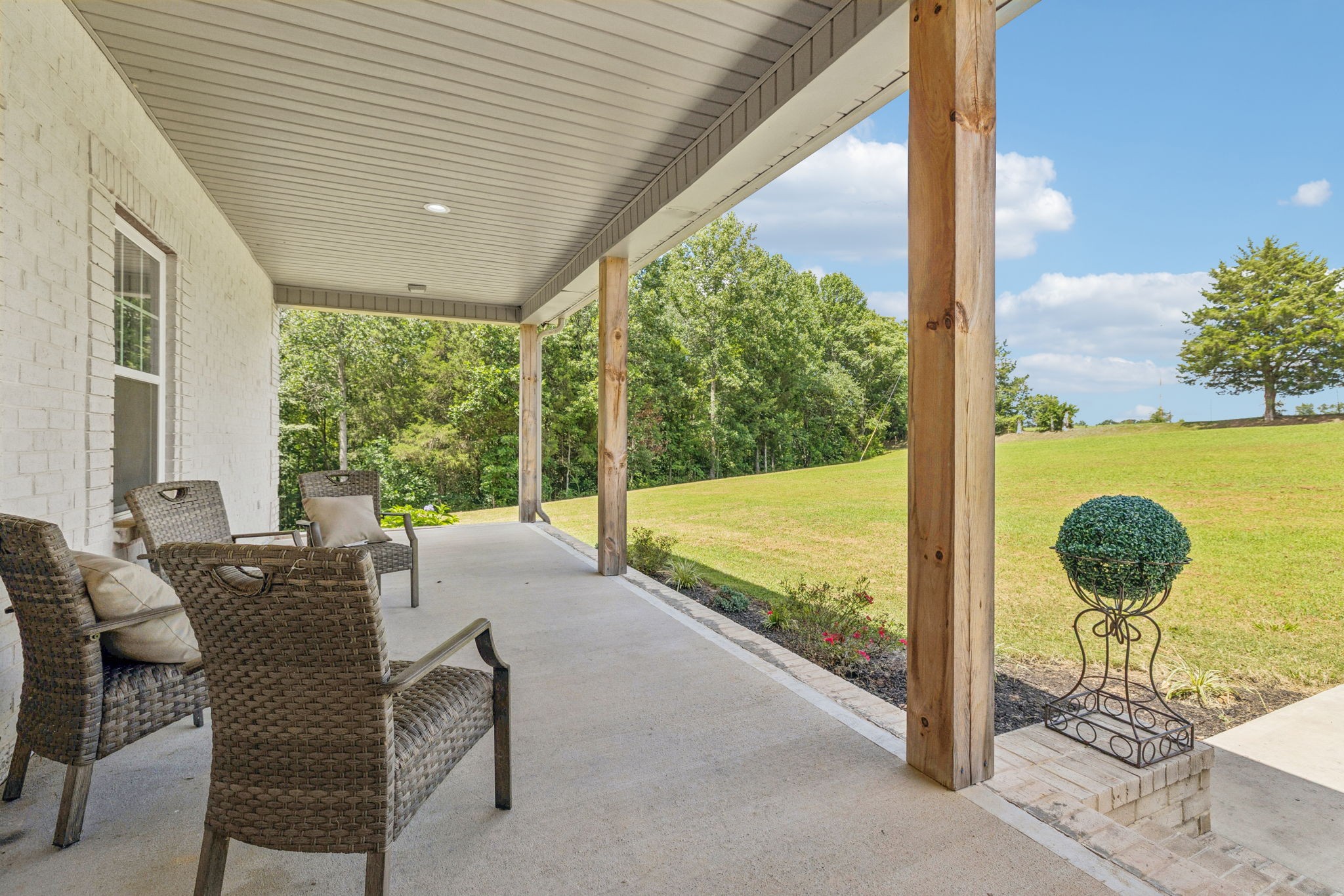 977 Elzie Williams Road Red Boiling Springs, TN 37150 - Photo 6 of 52 a view of a two chairs and table in the patio