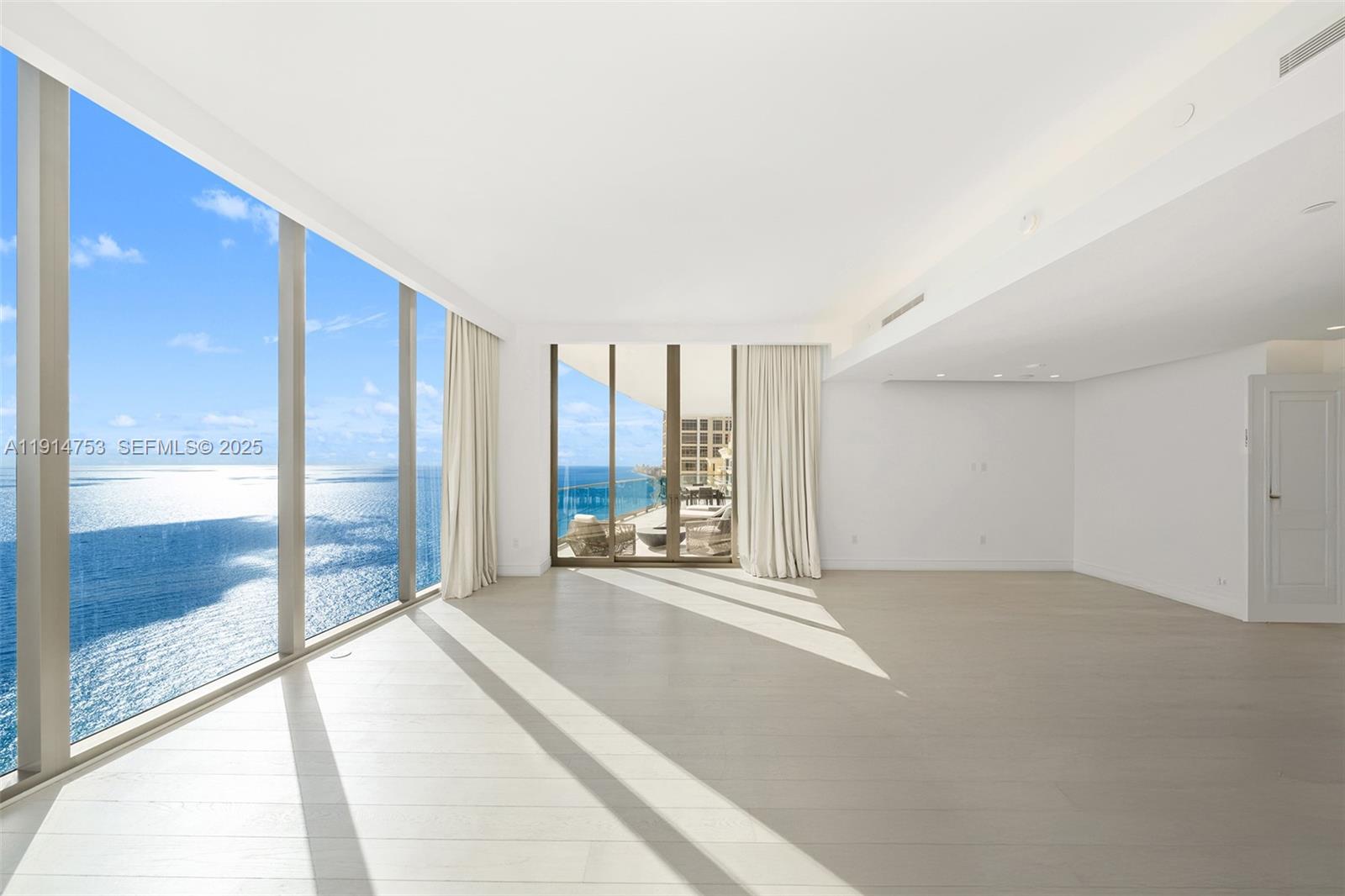 17901 Collins Avenue, Unit 4507 Sunny Isles Beach, FL 33160 - Photo 11 of 58 a view of an empty room with a window