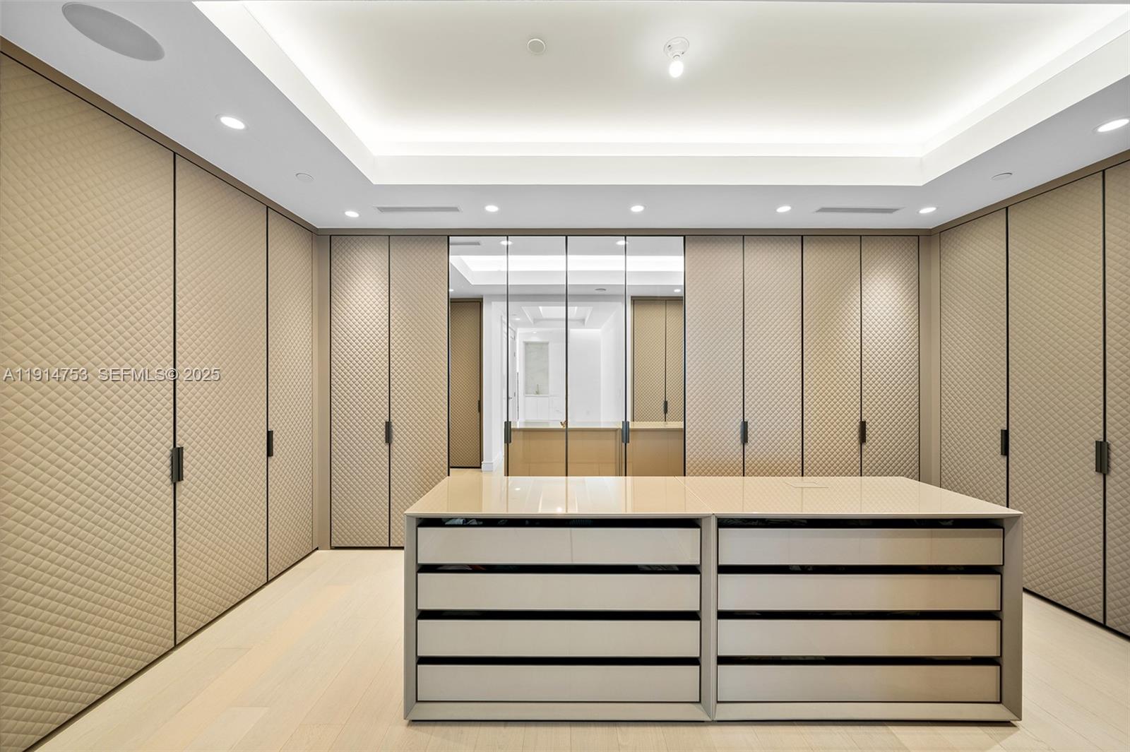 17901 Collins Avenue, Unit 4507 Sunny Isles Beach, FL 33160 - Photo 14 of 58 a bedroom with a large bed and a large window