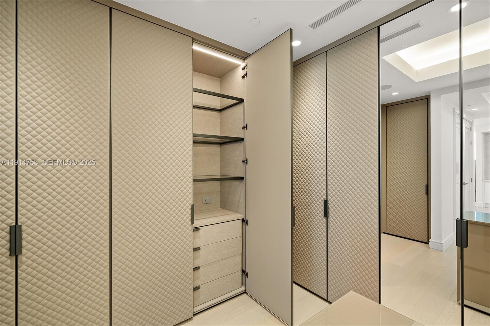 17901 Collins Avenue, Unit 4507 Sunny Isles Beach, FL 33160 - Photo 15 of 58 a bathroom with a shower and a glass door