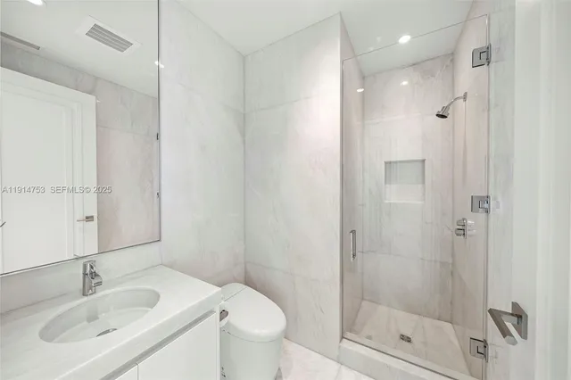 a view of a balcony with an ocean view