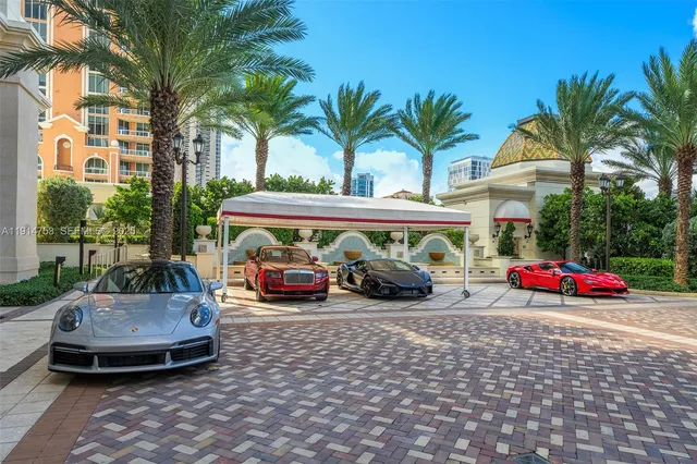 a view of a swimming pool with an outdoor seating
