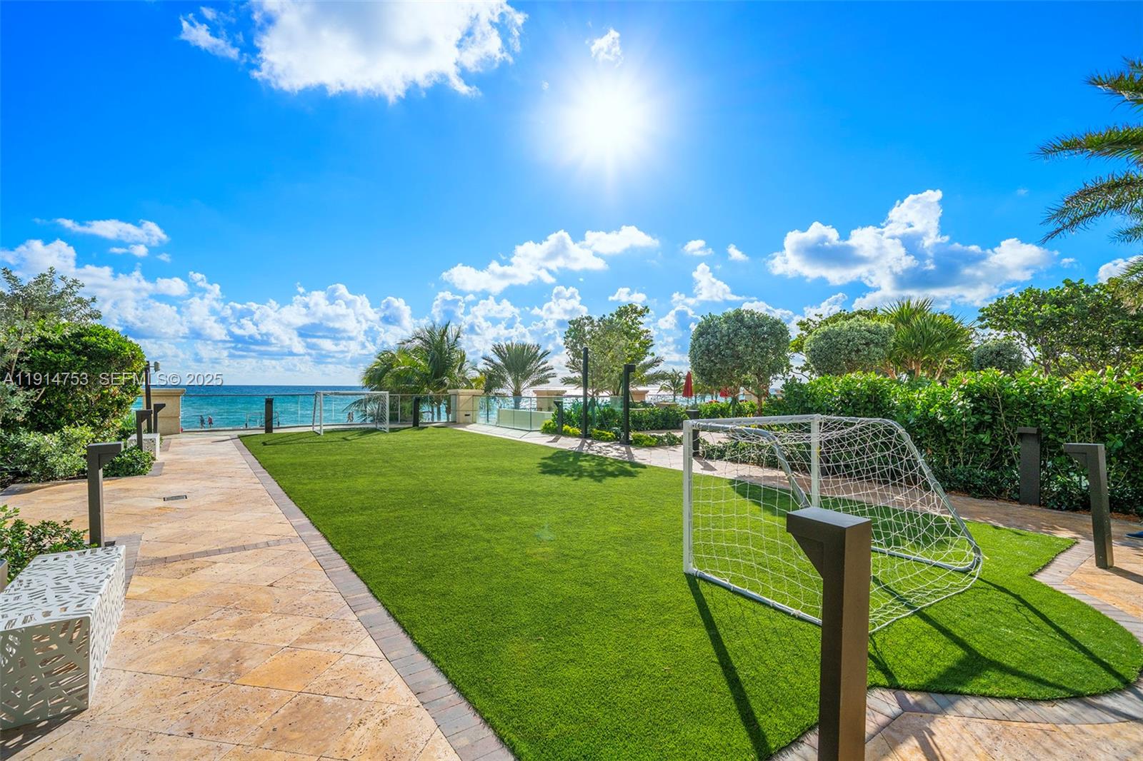 17901 Collins Avenue, Unit 4507 Sunny Isles Beach, FL 33160 - Photo 39 of 58 a view of a swimming pool with a patio