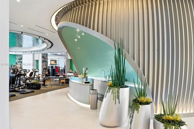 an outdoor space with pool and furniture