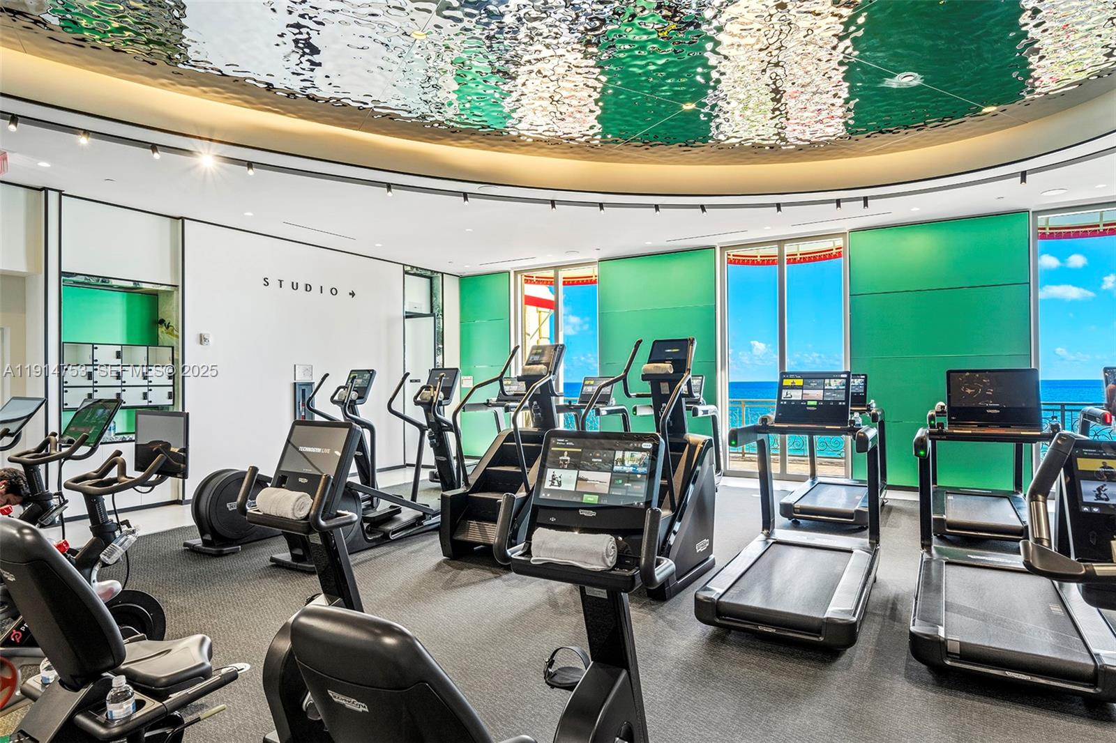 17901 Collins Avenue, Unit 4507 Sunny Isles Beach, FL 33160 - Photo 48 of 58 a view of a room with gym equipment