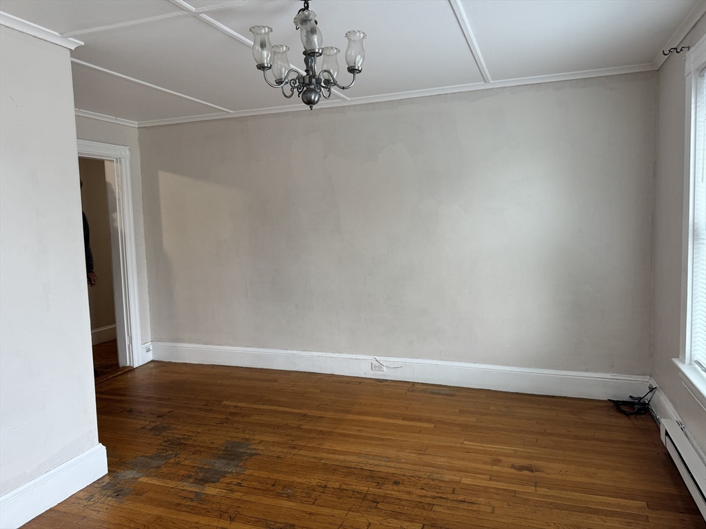 41 Pleasant Street, Unit 1 Attleboro, MA 02703 - Photo 8 of 9 a view of a room with wooden floor