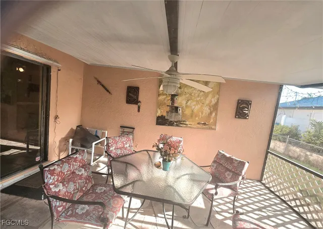 a view of a garden with a building in the background