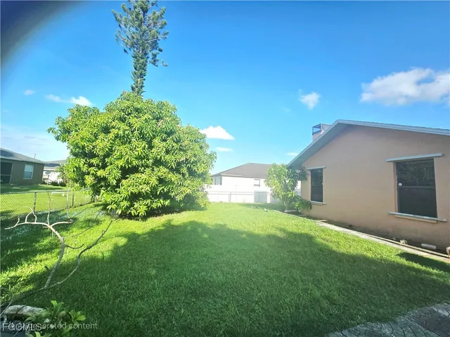 a house view with a garden space