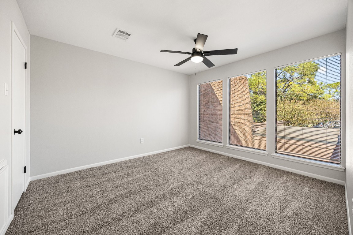 15686 Barkers Landing Road Houston, TX 77079 - Photo 18 of 32 Secondary Bedroom offers fresh carpet & 3 large windows