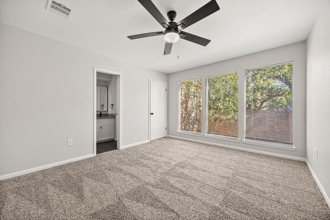 15686 Barkers Landing Road Houston, TX 77079 - Photo 19 of 32 Secondary Bedroom offers fresh carpet & 3 large windows