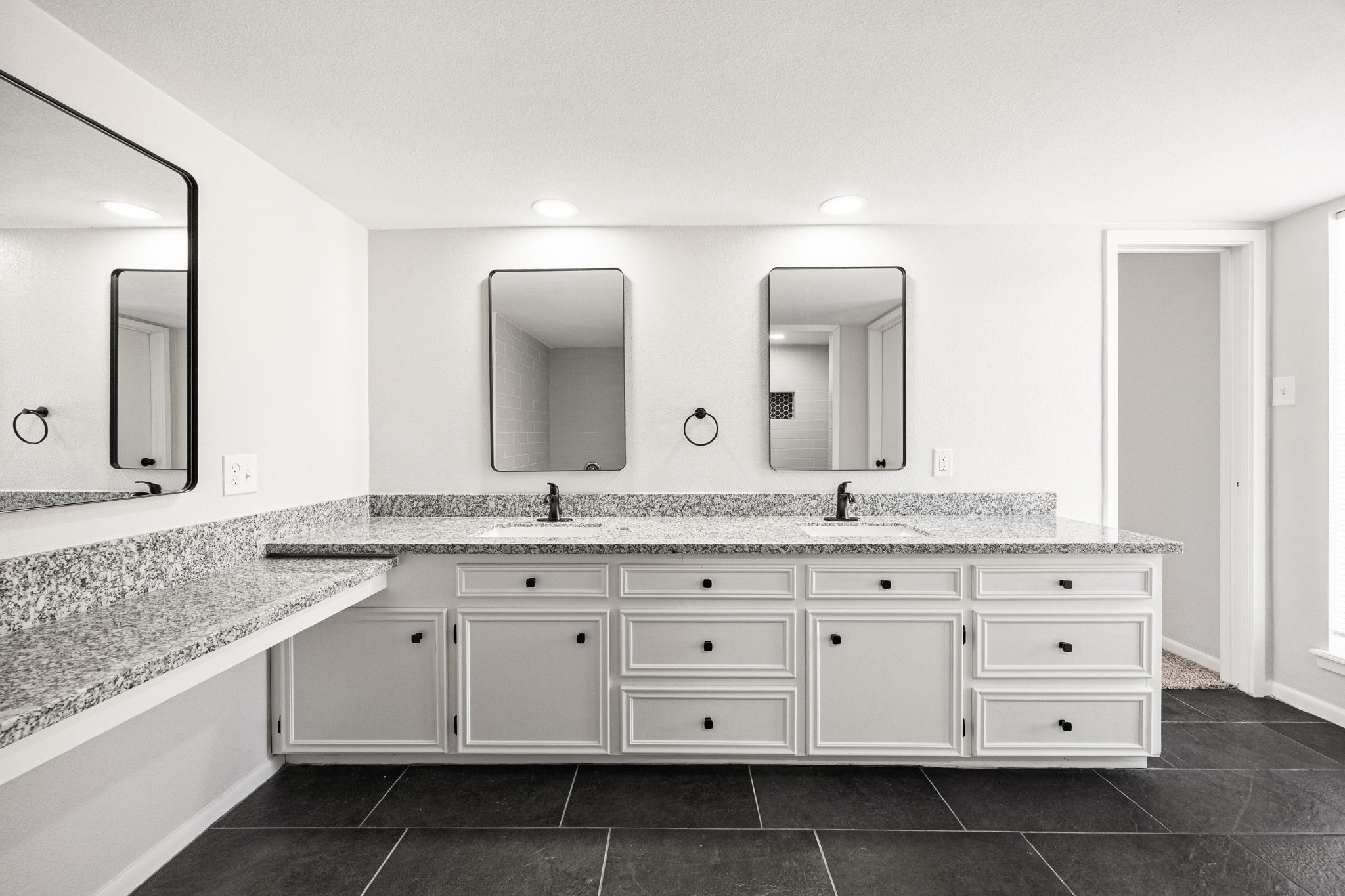 15686 Barkers Landing Road Houston, TX 77079 - Photo 23 of 32 a bathroom with a granite countertop double vanity sink and mirror