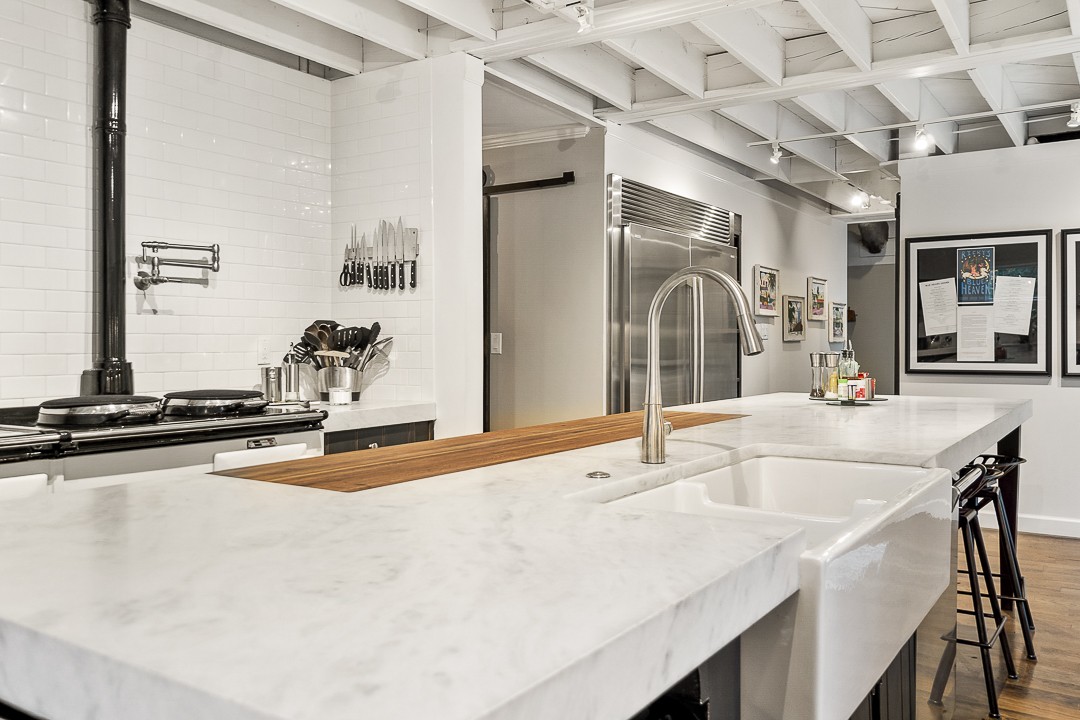 1180 Mt Vernon Road Cookeville, TN 38501 - Photo 11 of 48 a bathroom with a granite countertop sink and a large mirror
