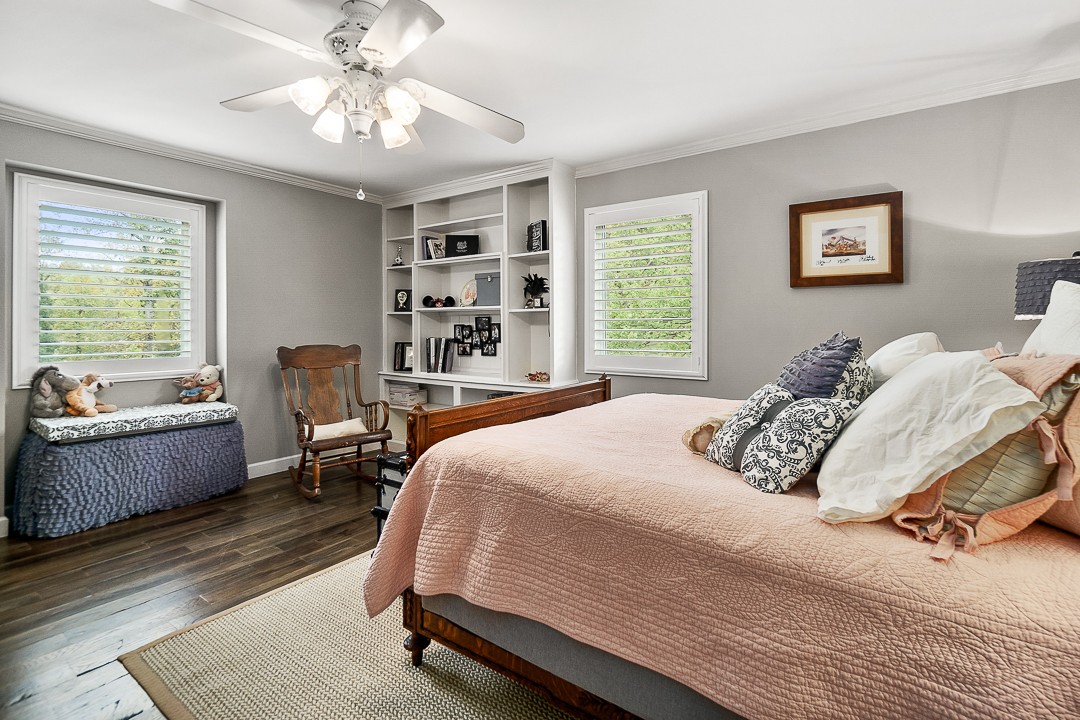 1180 Mt Vernon Road Cookeville, TN 38501 - Photo 18 of 48 a bedroom with a bed and a chandelier