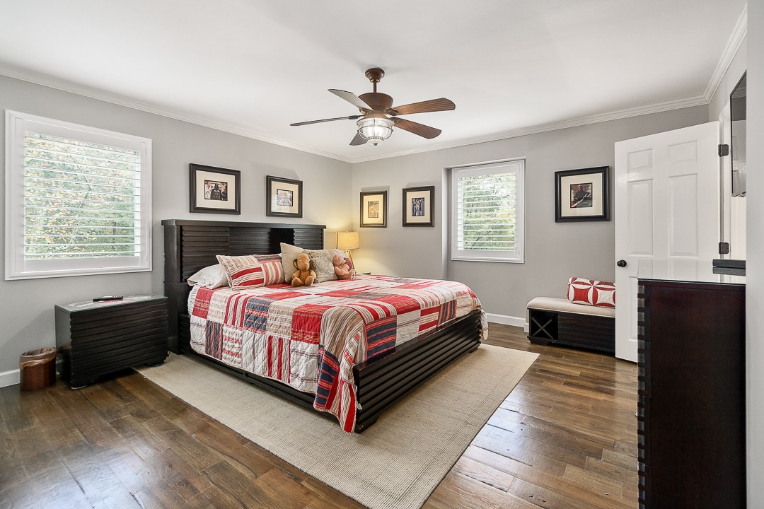 1180 Mt Vernon Road Cookeville, TN 38501 - Photo 22 of 48 a bedroom with a bed and a chandelier