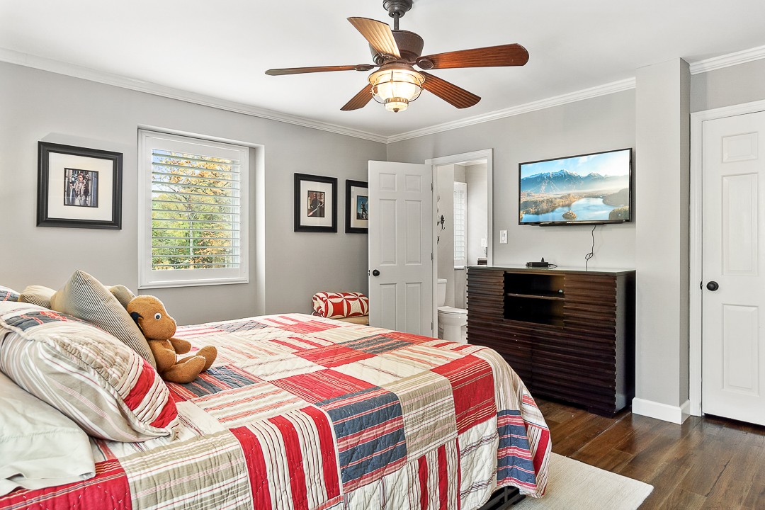 1180 Mt Vernon Road Cookeville, TN 38501 - Photo 25 of 48 a bedroom with a bed and a chandelier