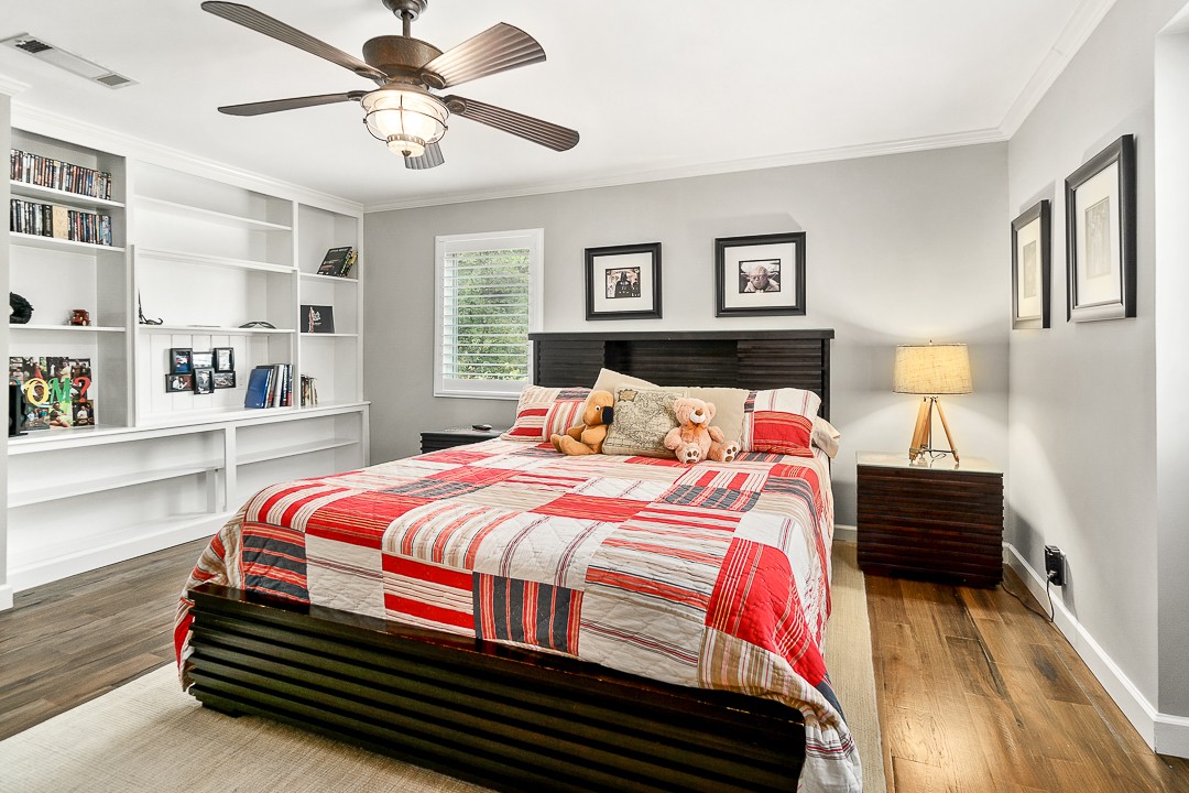 1180 Mt Vernon Road Cookeville, TN 38501 - Photo 26 of 48 a bedroom with bed and wooden floor