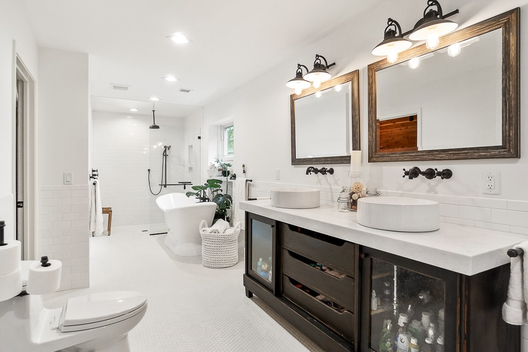 1180 Mt Vernon Road Cookeville, TN 38501 - Photo 30 of 48 a spacious bathroom with a double vanity sink toilet and a mirror