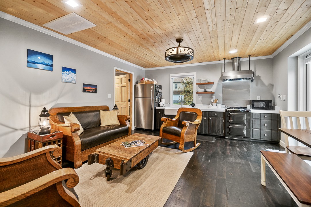 1180 Mt Vernon Road Cookeville, TN 38501 - Photo 35 of 48 a living room with lots of furniture and kitchen view