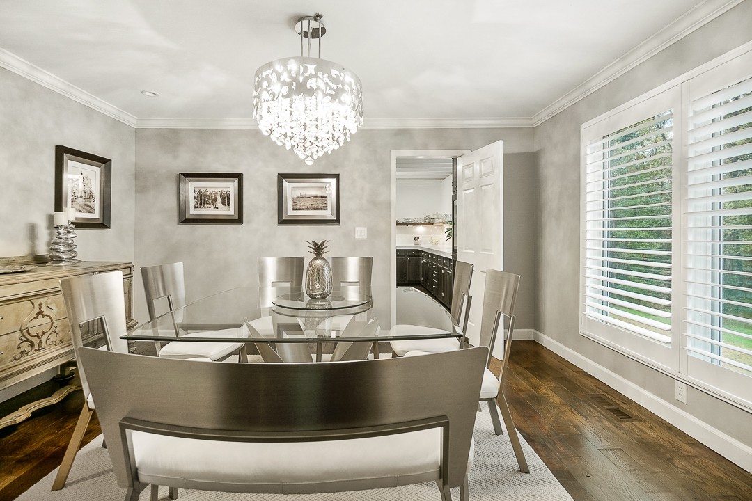 1180 Mt Vernon Road Cookeville, TN 38501 - Photo 5 of 48 a view of a dining room with furniture a chandelier and wooden floor