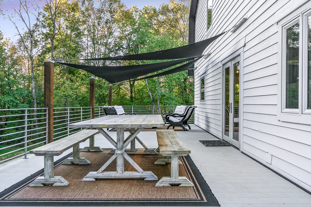 1180 Mt Vernon Road Cookeville, TN 38501 - Photo 41 of 48 a view of roof deck with chairs and wooden fence