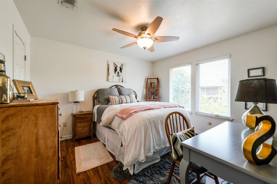 201 East 35th Street, Unit A Austin, TX 78705 - Photo 22 of 25 a bedroom with a bed and a desk