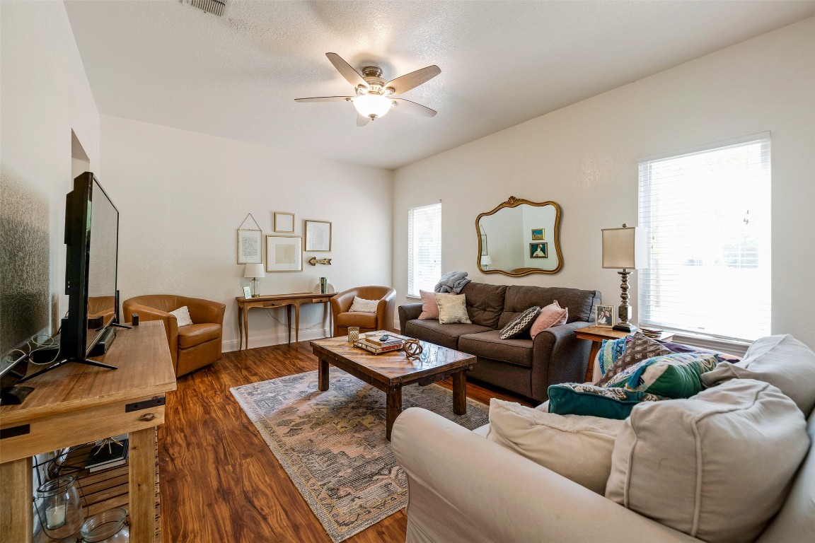 201 East 35th Street, Unit A Austin, TX 78705 - Photo 5 of 25 a living room with furniture and a flat screen tv