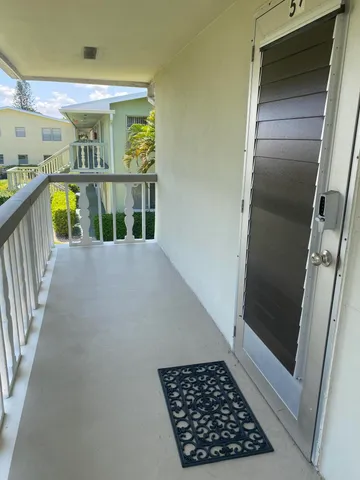 a view of entryway with a front door