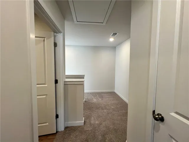 a bathroom with a sink mirror toilet and bathtub