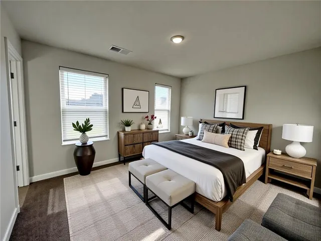 a bed room with a bed and furniture