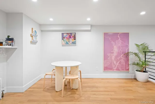 a view of a room with a table and chair
