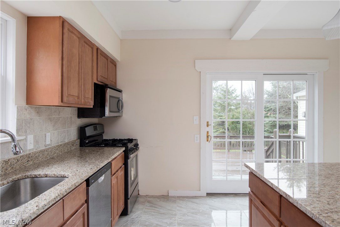5452 Highland Road Cleveland, OH 44143 - Photo 6 of 29 Enjoy the bling from the new granite counter-tops and modern ceramic flooring!