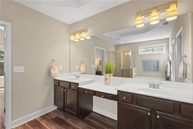 a view with a sink and a mirror