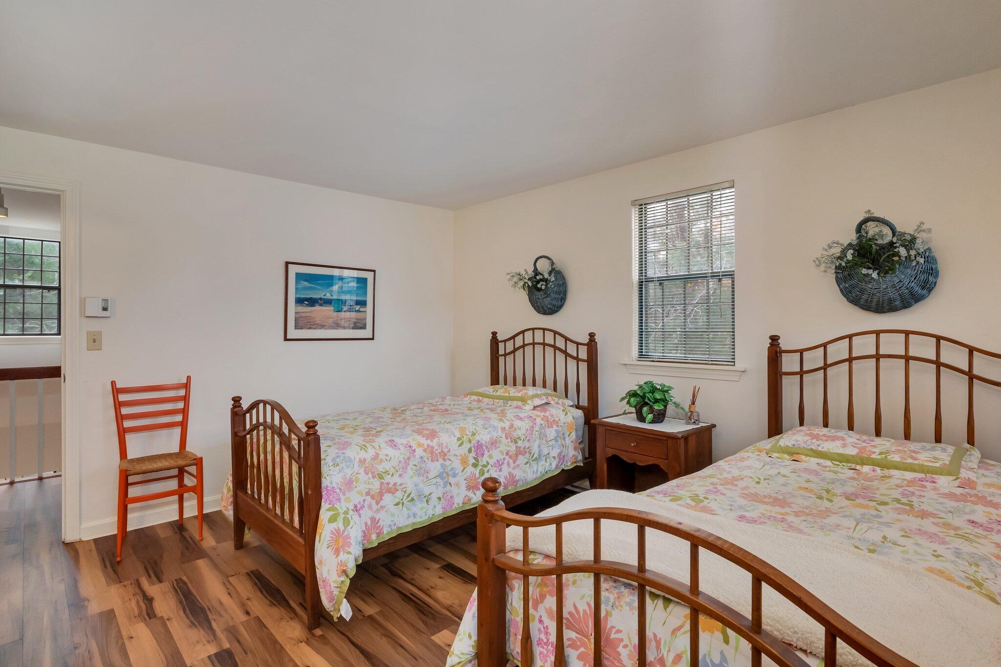 109 Nobadeer Road Centerville, MA 02632 - Photo 18 of 36 a bedroom with two beds and a window