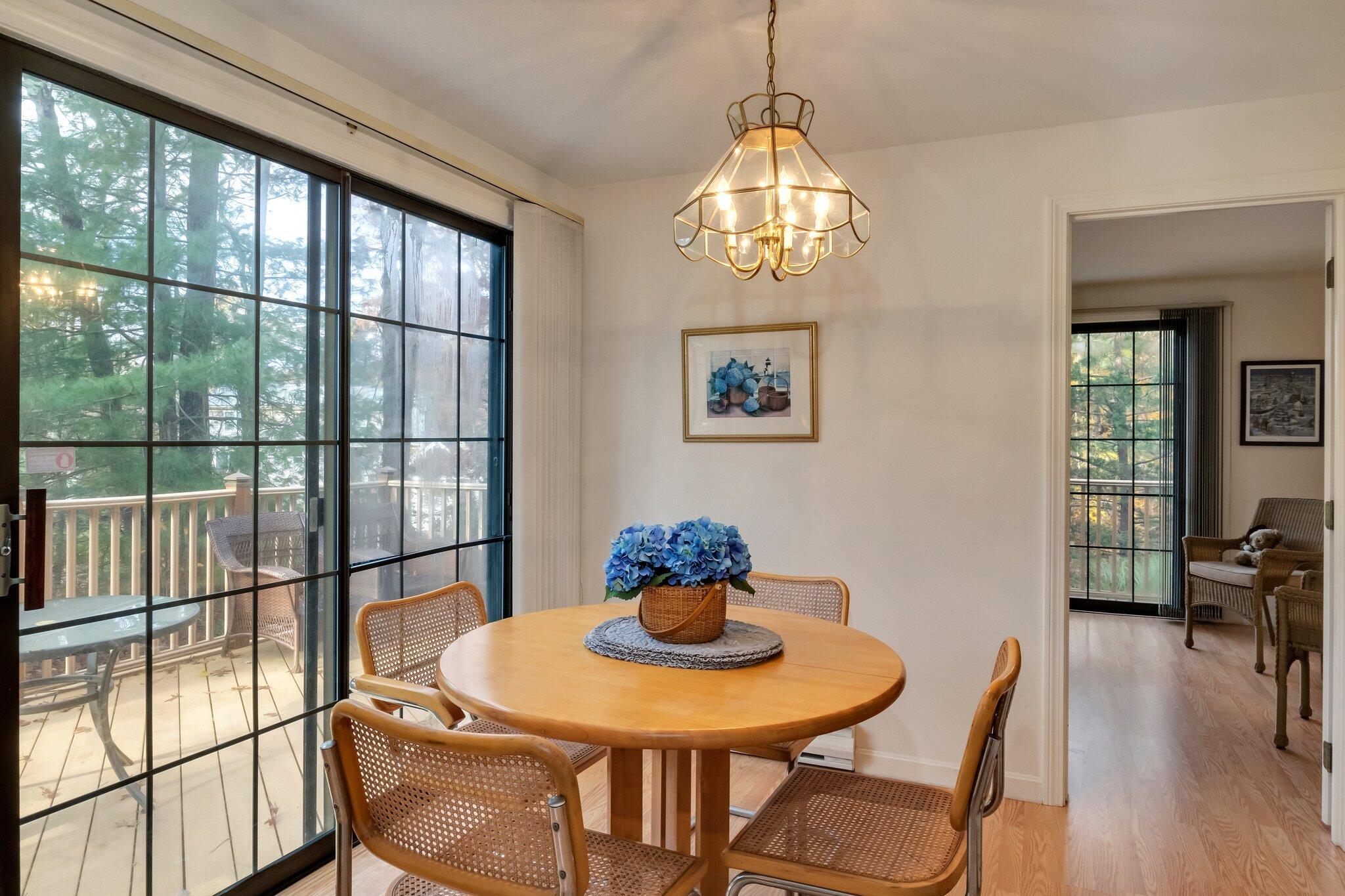 109 Nobadeer Road Centerville, MA 02632 - Photo 8 of 36 a view of a dining room with furniture window and wooden floor