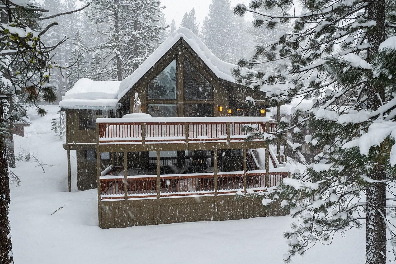 148 Basque Drive Truckee, CA 96161 - Photo 1 of 21 a front view of a house with a yard