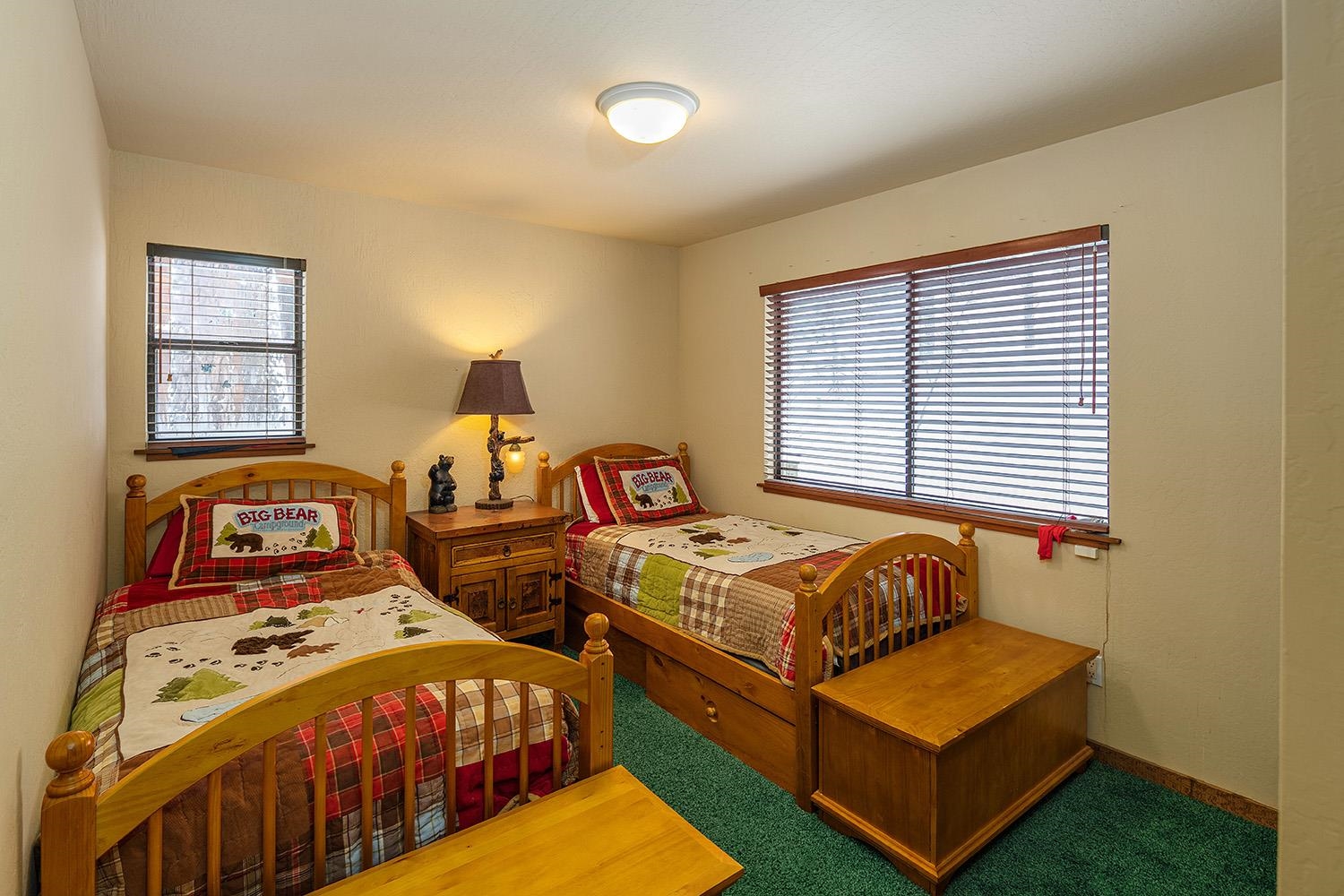 148 Basque Drive Truckee, CA 96161 - Photo 12 of 21 a bedroom with two beds and a window