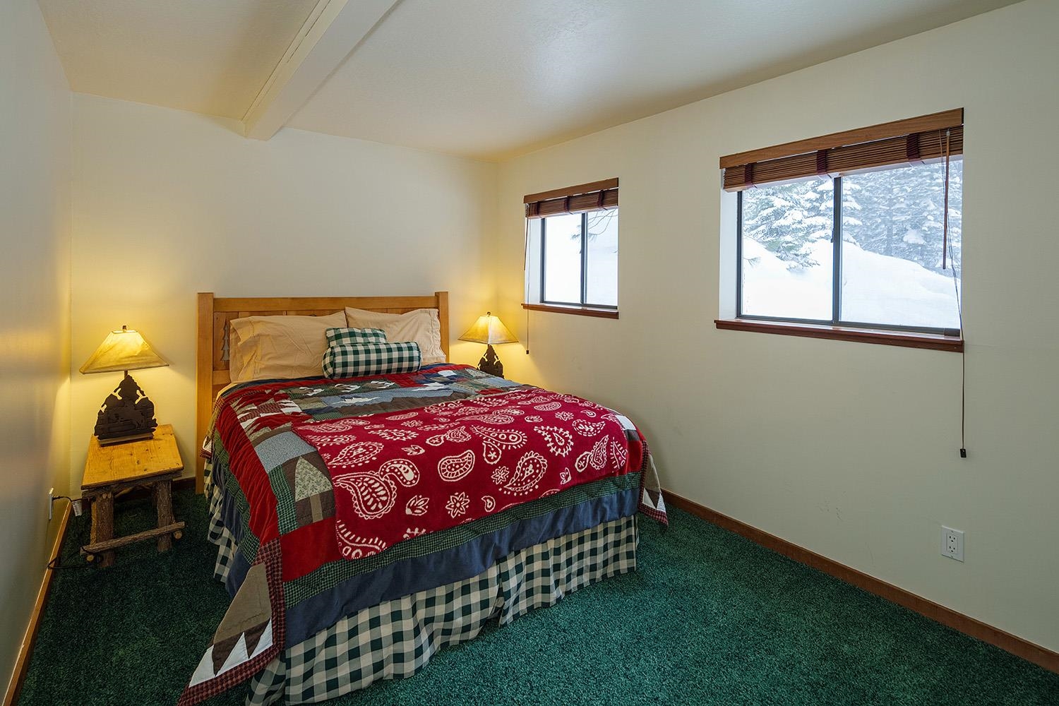 148 Basque Drive Truckee, CA 96161 - Photo 18 of 21 a bedroom with a bed and window