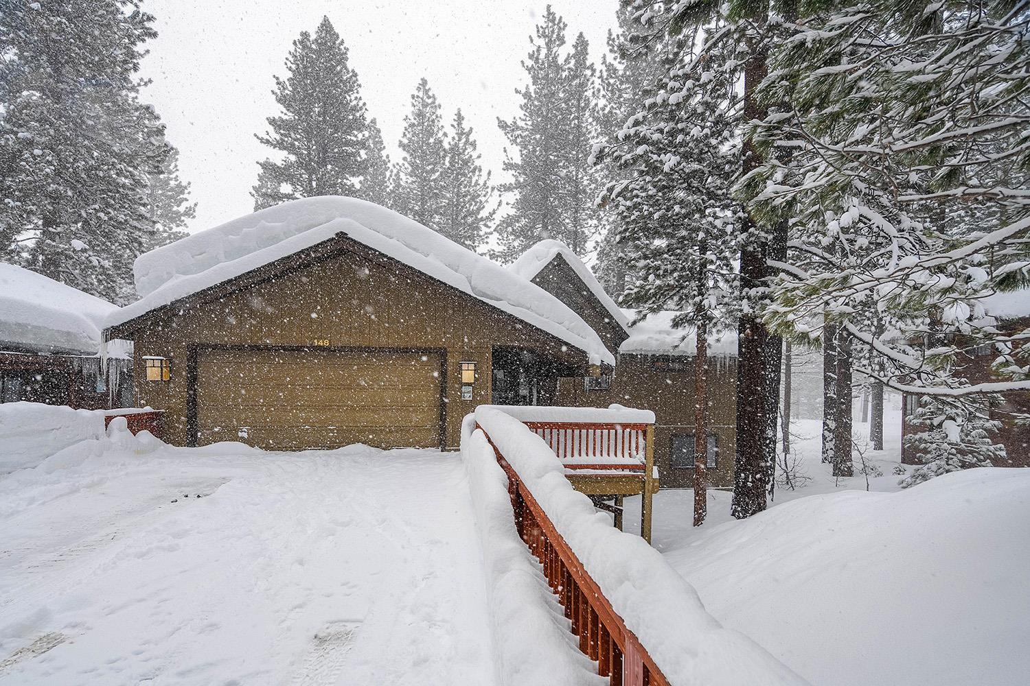 148 Basque Drive Truckee, CA 96161 - Photo 2 of 21 a view of a house with a snow in the yard