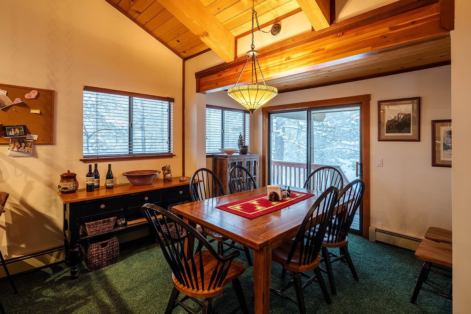 148 Basque Drive Truckee, CA 96161 - Photo 5 of 21 a view of a dining room with furniture window and outside view