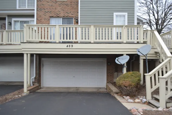 front view of a house with a balcony