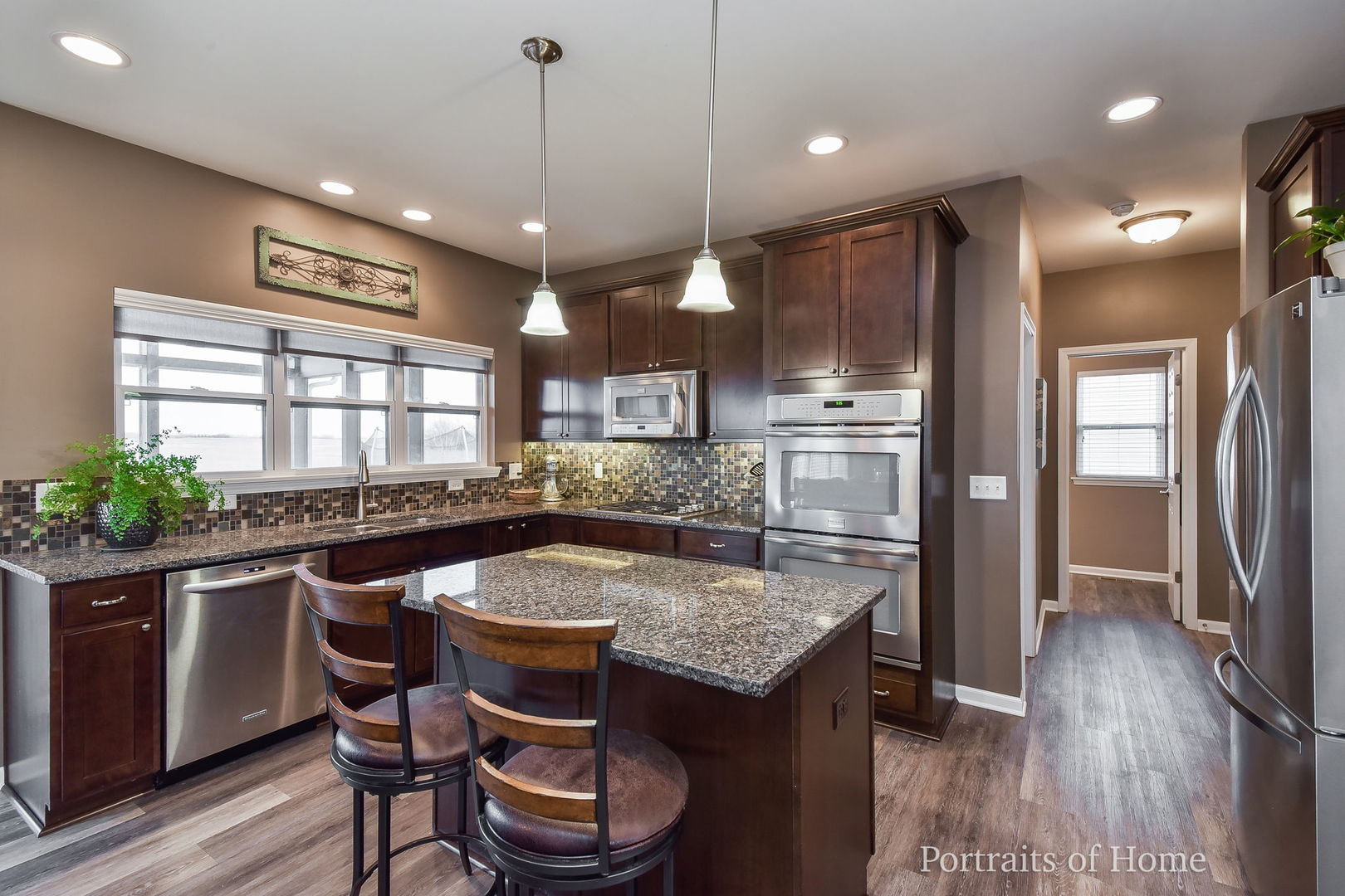 40W195 Palmer Road Geneva, IL 60134 - Photo 6 of 24 a kitchen with a table and chairs in it