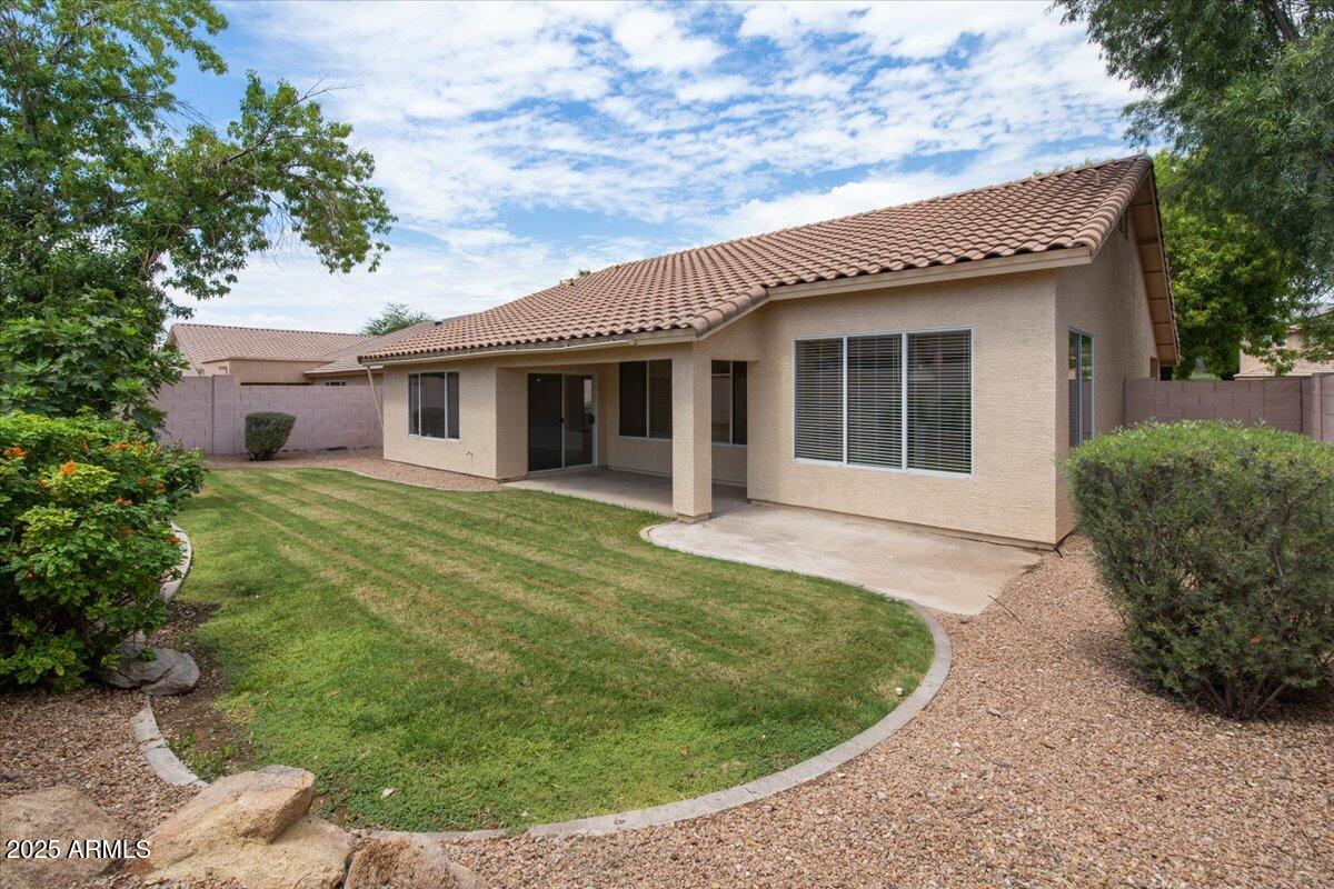 1563 East Robinson Way Chandler, AZ 85225 - Photo 20 of 21 a view of a house with a backyard